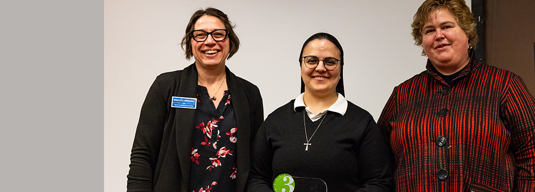 3MT Winner Sr. Cynthia El Kassis pictured with Dean Drenovsky and Interim VP of Academic Affairs Dr. Gunzenhauser