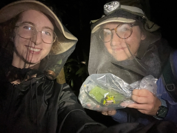 Carly Anderson and Molly Russell holding a frog